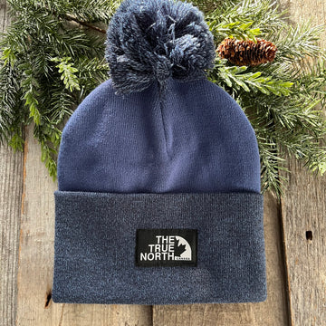 TRUE NORTH POM POM TOQUE