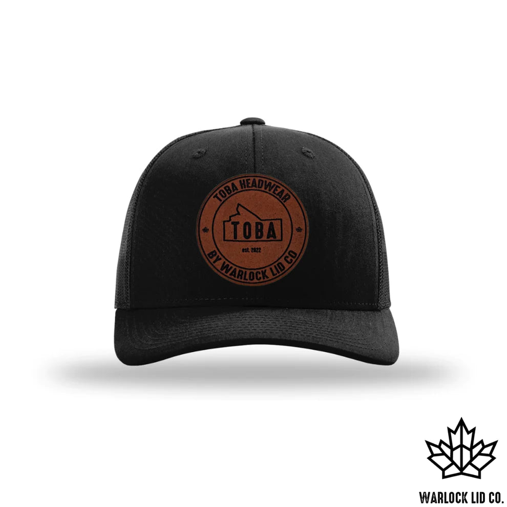 TOBA LEATHER PATCH SNAPBACK HAT