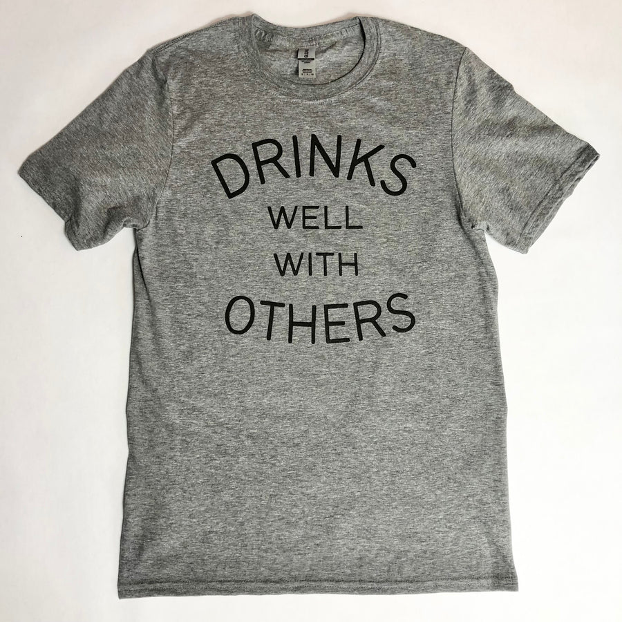 DRINKS WELL WITH OTHERS T-SHIRT